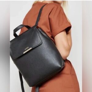 2 for $30 sale: Guess black pebbled faux leather satchel backpack